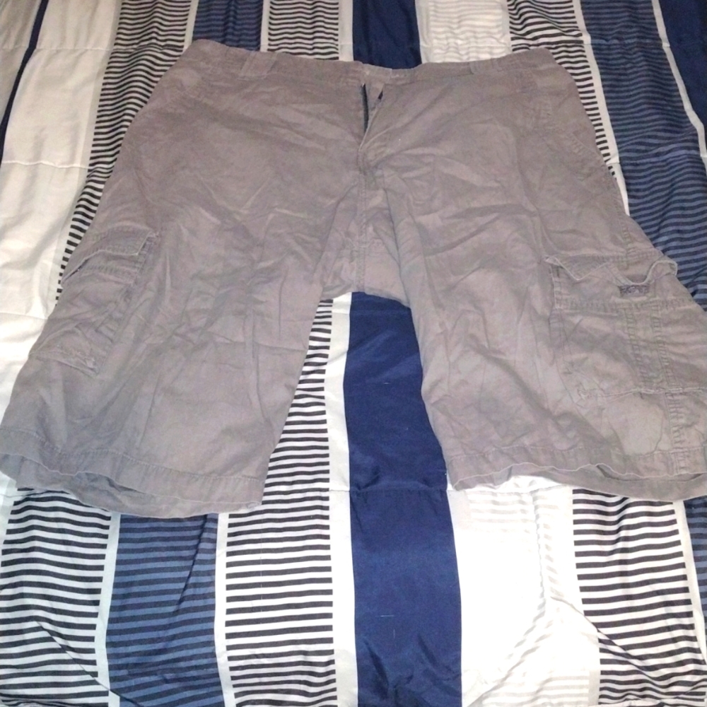 Very nice rocawear long cargo shorts gray in color